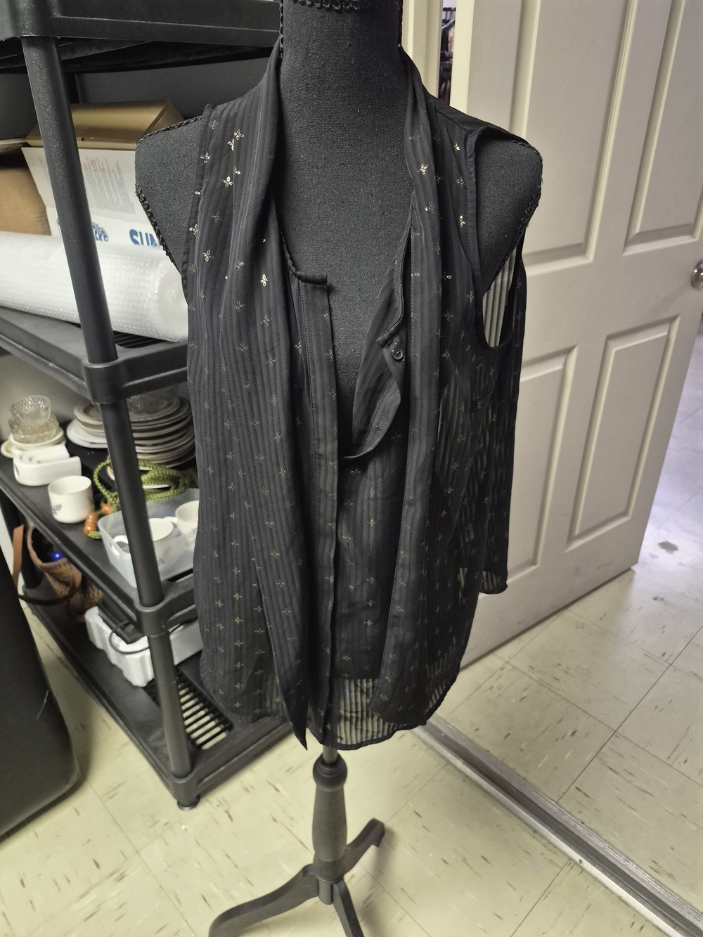 Sleeveless Black Sheer Shirt with Metallic Star Detail